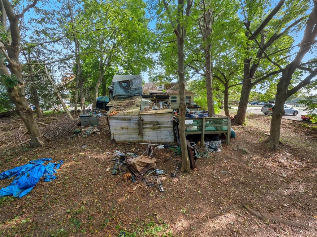 29 Conant Street Beverly, MA 01915 - Photo 18 of 20 a view of a backyard with sitting area