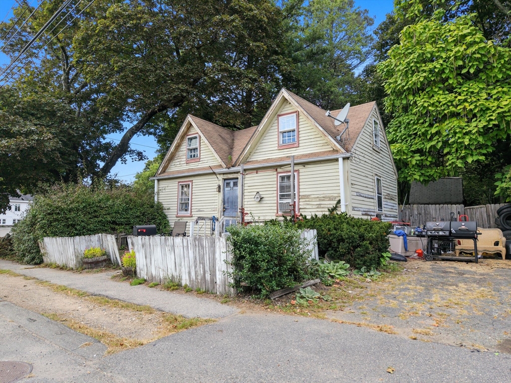 29 Conant Street Beverly, MA 01915 - Photo 2 of 20 a view of a house with a yard and plants