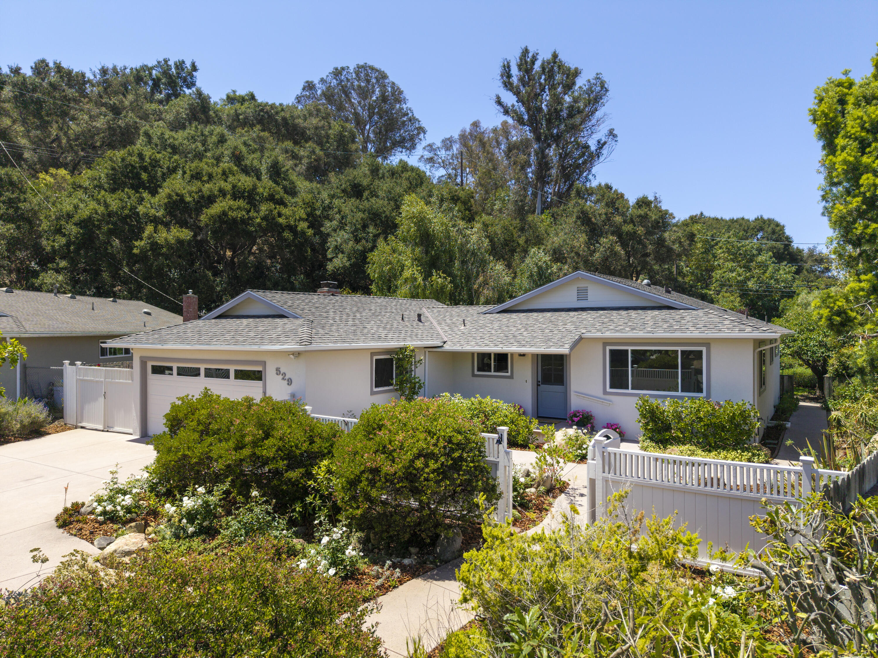 529 Via Rueda Santa Barbara, CA 93110 - Photo 2 of 34 a front view of house with yard and green space