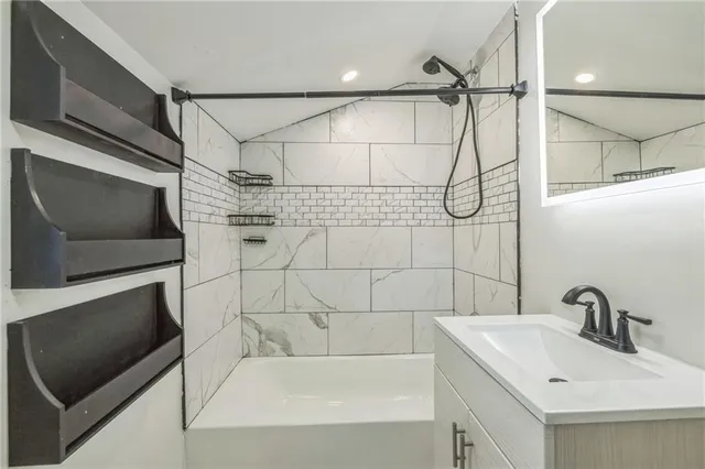 a bathroom with a sink and a shower