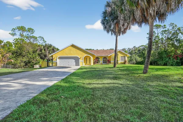 a view of outdoor space yard and garage