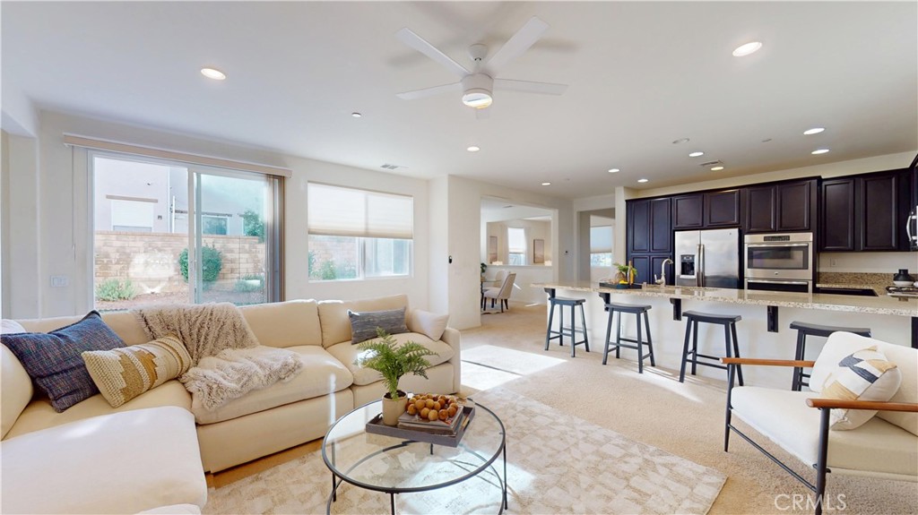 28620 Vista Del Rio Drive Valencia, CA 91354 - Photo 18 of 40 a living room with furniture kitchen and a large window