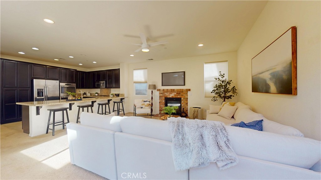 28620 Vista Del Rio Drive Valencia, CA 91354 - Photo 19 of 40 a living room with furniture and a flat screen tv