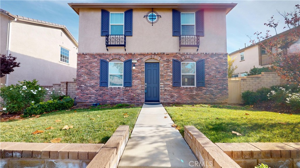 28620 Vista Del Rio Drive Valencia, CA 91354 - Photo 2 of 40 a front view of a house with garden