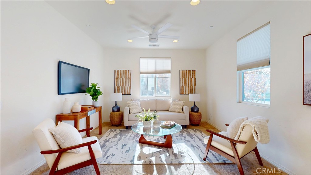 28620 Vista Del Rio Drive Valencia, CA 91354 - Photo 22 of 40 a living room with furniture and a flat screen tv