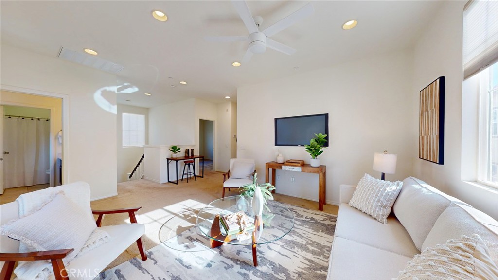 28620 Vista Del Rio Drive Valencia, CA 91354 - Photo 24 of 40 a living room with furniture and wooden floor