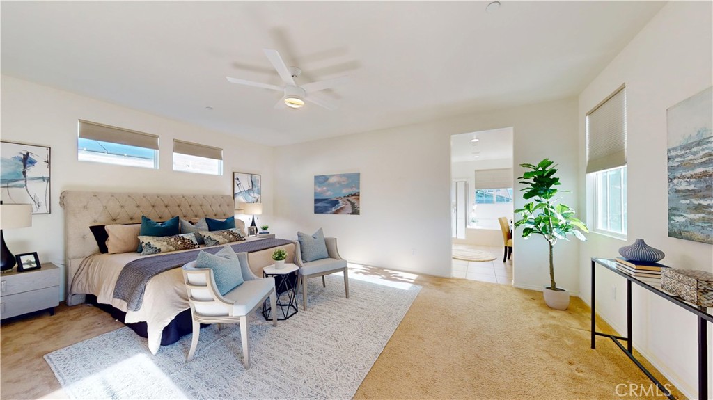 28620 Vista Del Rio Drive Valencia, CA 91354 - Photo 25 of 40 a bed room with a bed and potted plant