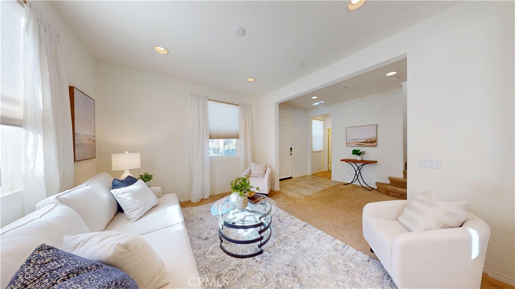 28620 Vista Del Rio Drive Valencia, CA 91354 - Photo 5 of 40 a living room with furniture and a wooden floor