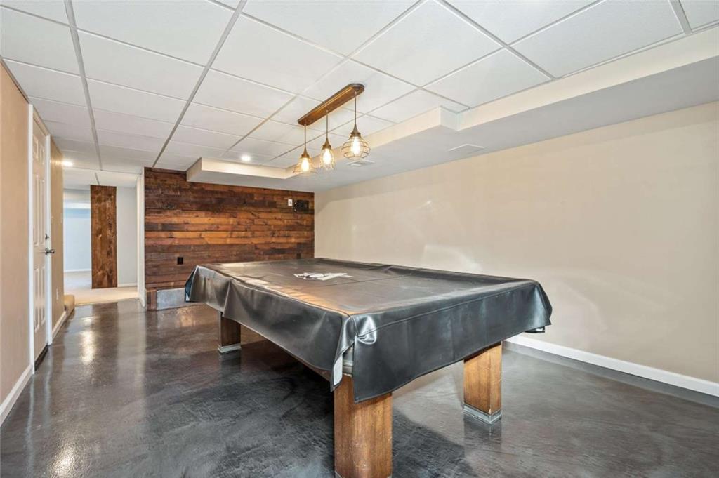 9767 Bellcrest Road Pittsburgh, PA 15237 - Photo 24 of 25 a view of an empty room with wooden floor
