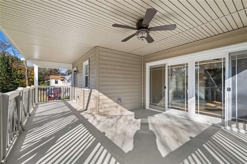 9767 Bellcrest Road Pittsburgh, PA 15237 - Photo 4 of 25 a view of a porch with wooden floor