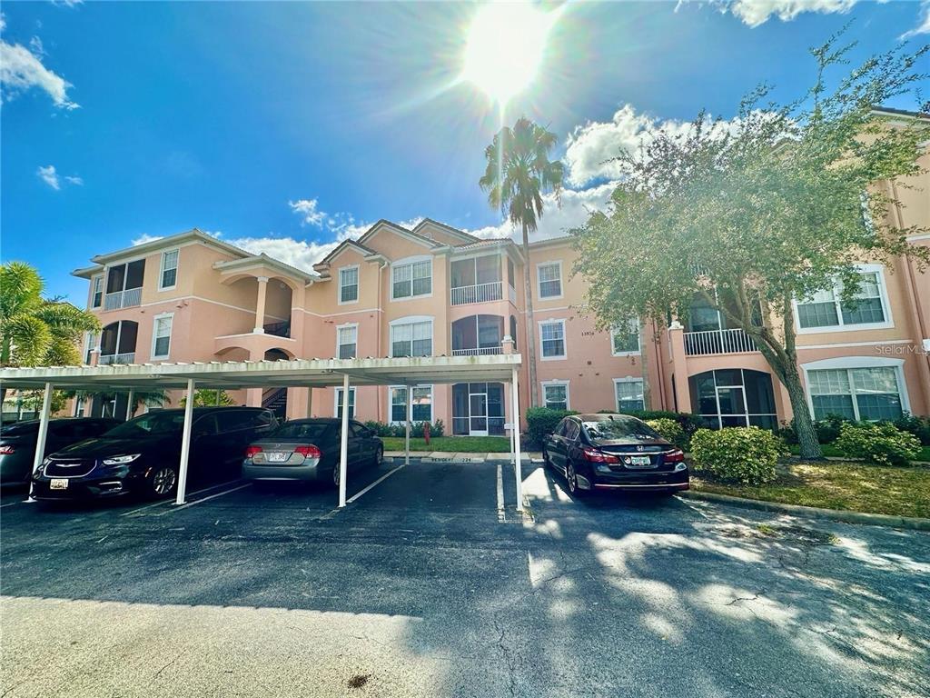 13536 Turtle Marsh Loop, Unit 532 Orlando, FL 32837 - Photo 1 of 26 a view of a house with a yard