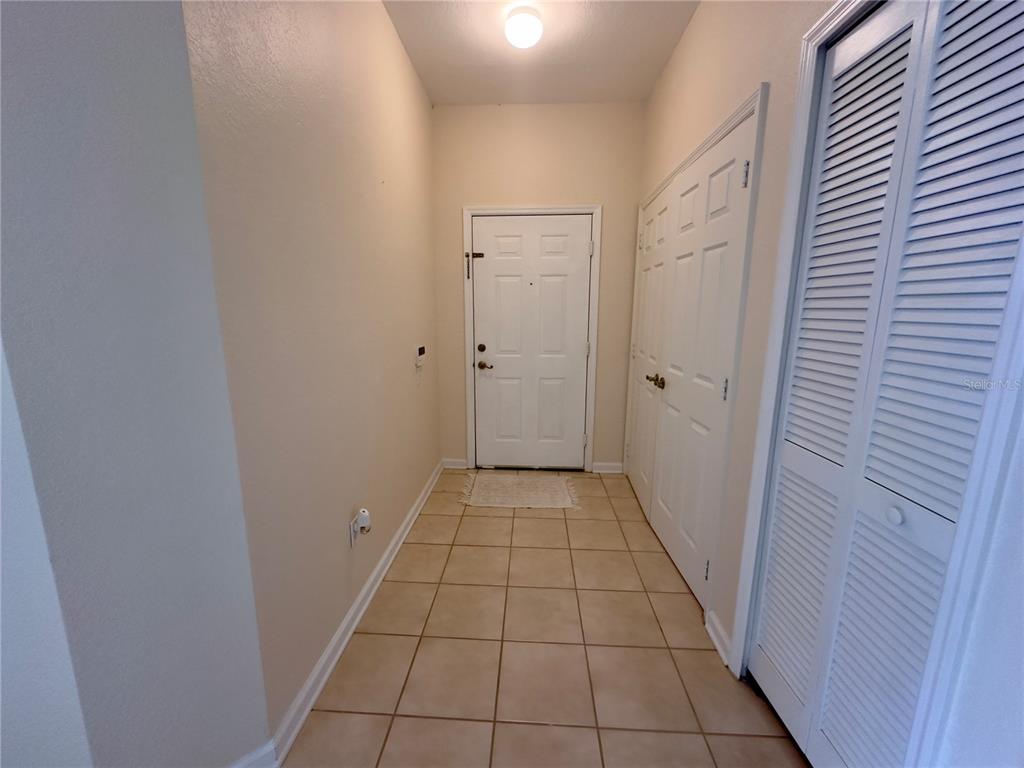 13536 Turtle Marsh Loop, Unit 532 Orlando, FL 32837 - Photo 14 of 26 a view of a hallway