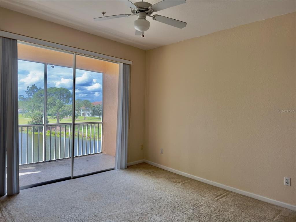 13536 Turtle Marsh Loop, Unit 532 Orlando, FL 32837 - Photo 23 of 26 a view of a room with a large window