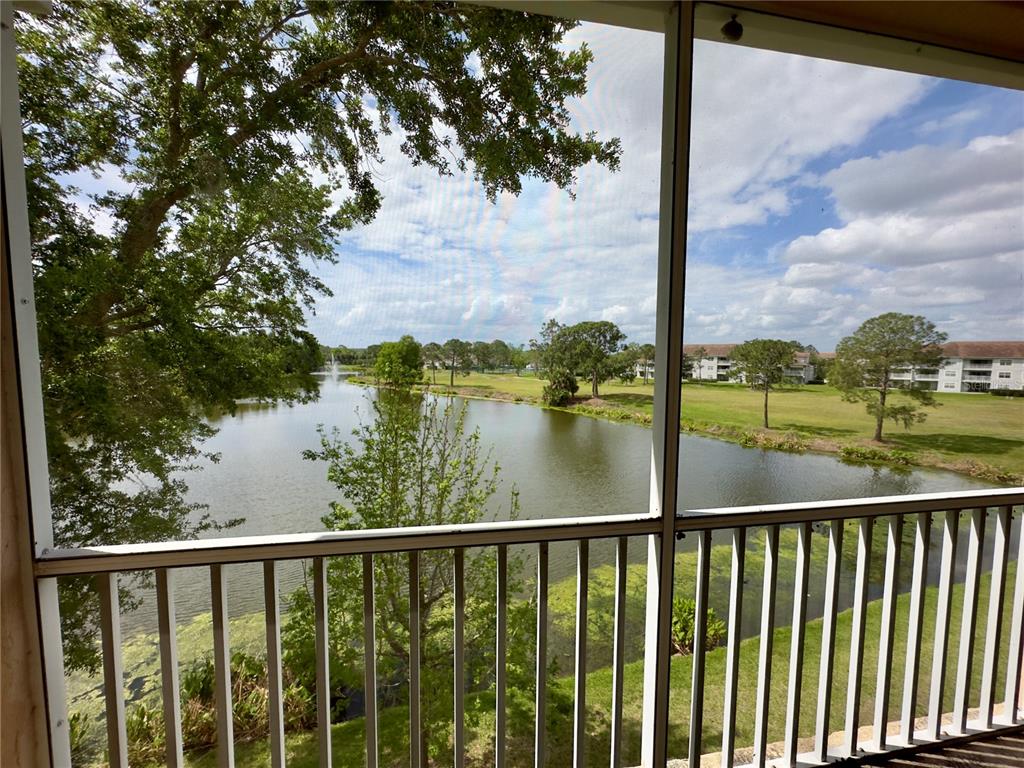 13536 Turtle Marsh Loop, Unit 532 Orlando, FL 32837 - Photo 26 of 26 a view of lake from balcony