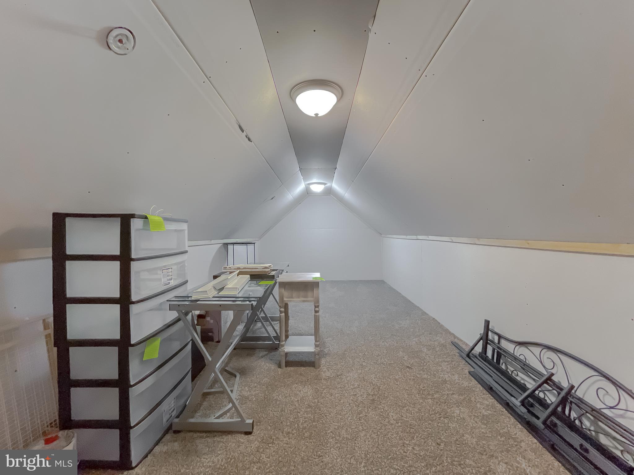 14264 Foxhall Road, Unit 24 Solomons, MD 20629 - Photo 43 of 56 Storage above garage