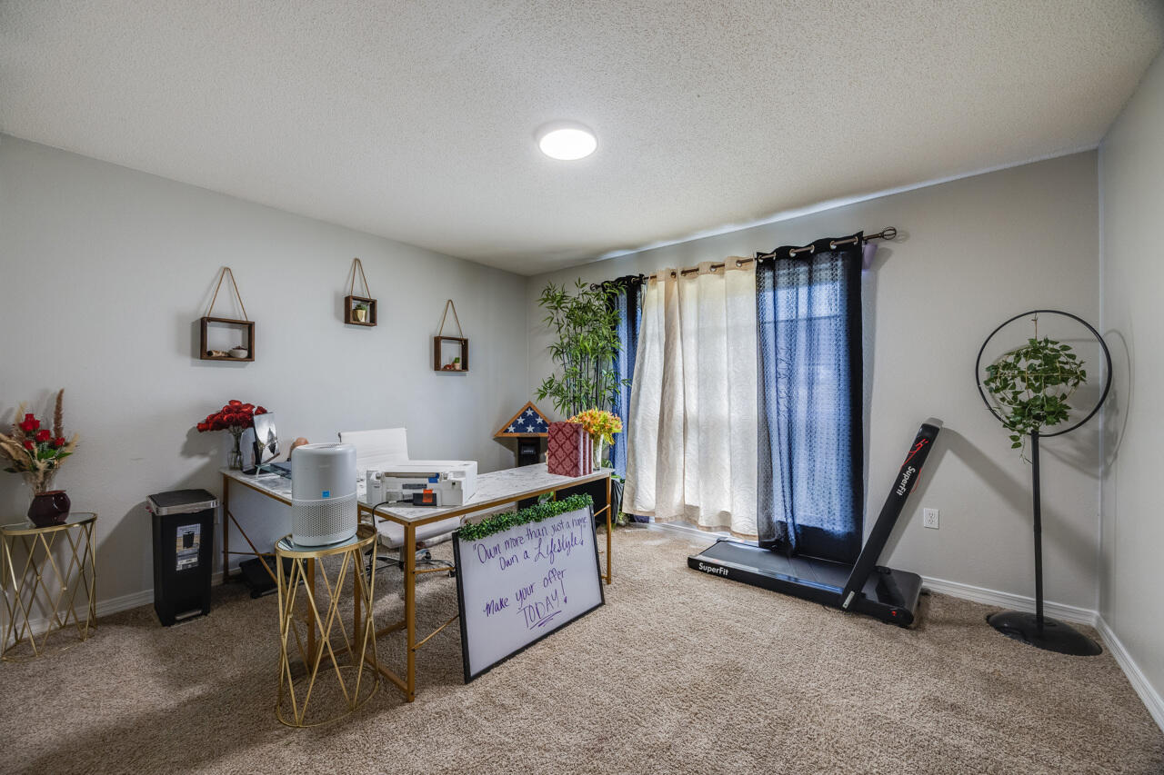 419 Triton Street Crestview, FL 32536 - Photo 40 of 60 a room with furniture and white walls