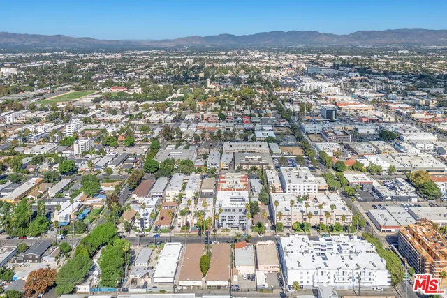 a white building with a view of a city