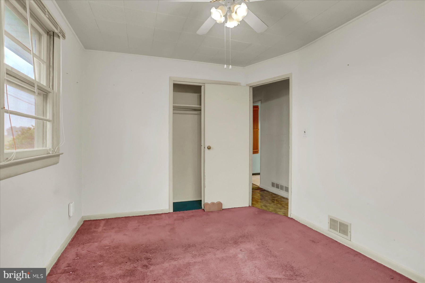 2115 White House Road Bel Air, MD 21015 - Photo 12 of 30 an empty room with windows and closet