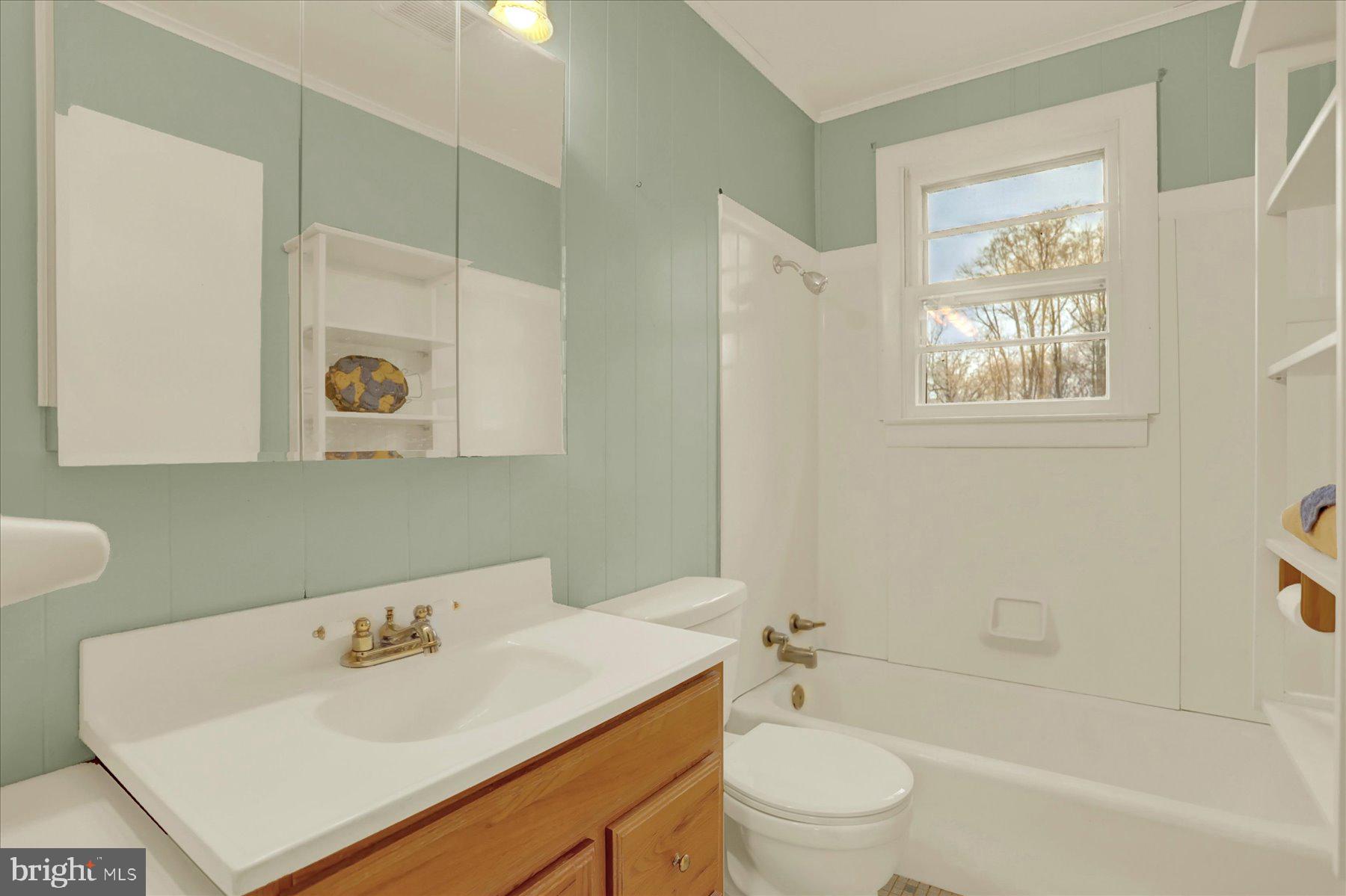 2115 White House Road Bel Air, MD 21015 - Photo 13 of 30 a bathroom with a sink a toilet and shower