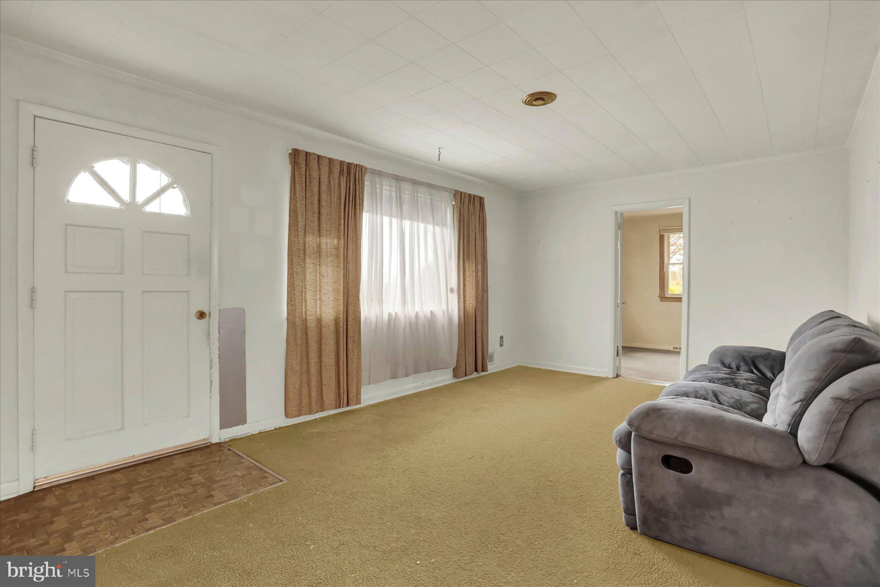 2115 White House Road Bel Air, MD 21015 - Photo 2 of 30 a living room with furniture and window