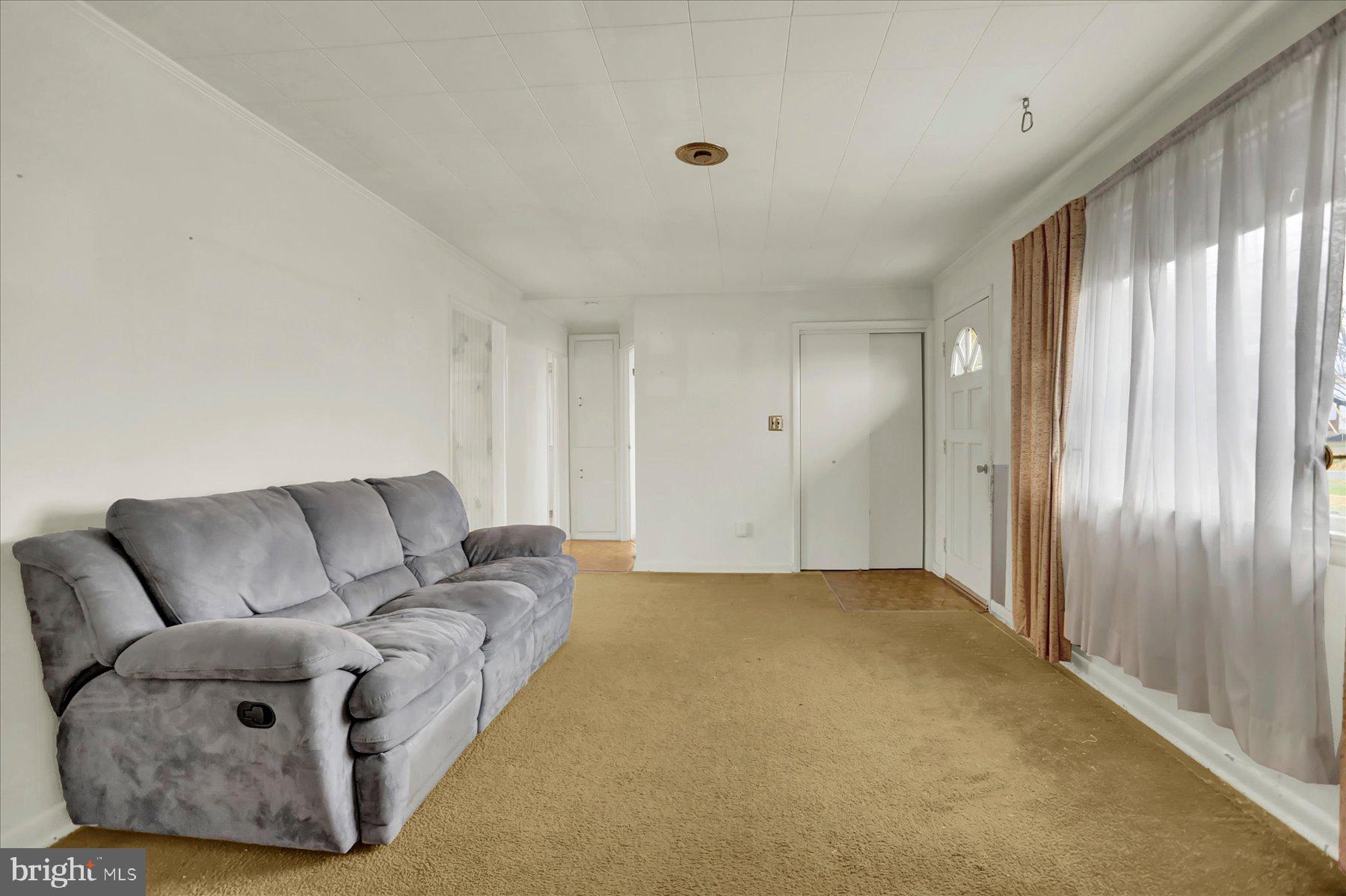 2115 White House Road Bel Air, MD 21015 - Photo 3 of 30 a living room with furniture and a window