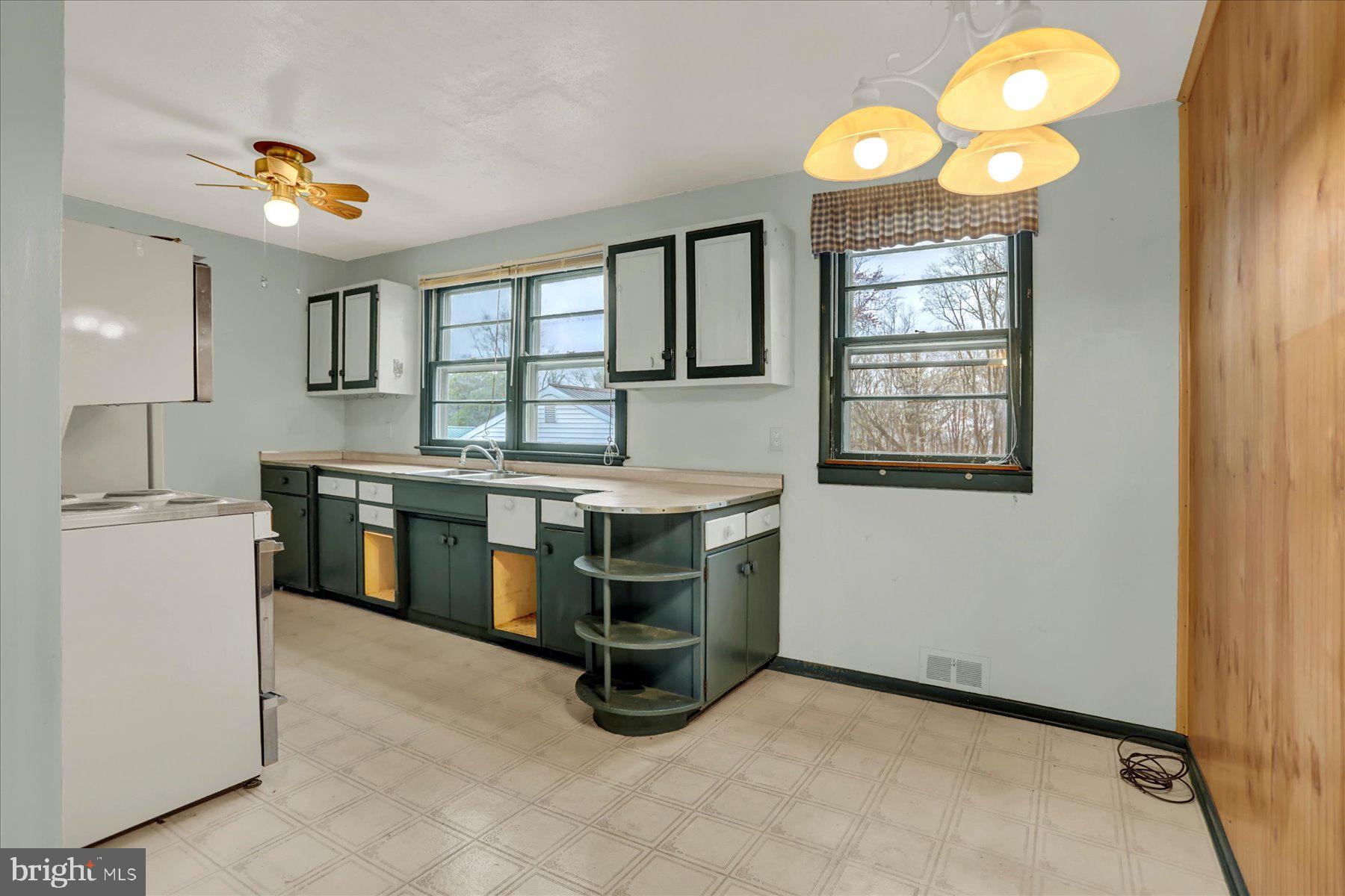2115 White House Road Bel Air, MD 21015 - Photo 4 of 30 a kitchen that has a lot of cabinets in it