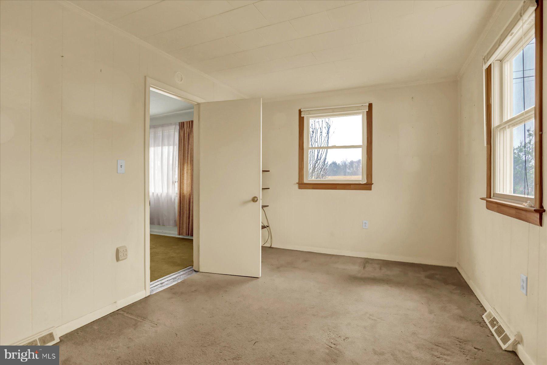 2115 White House Road Bel Air, MD 21015 - Photo 8 of 30 an empty room with windows and closet