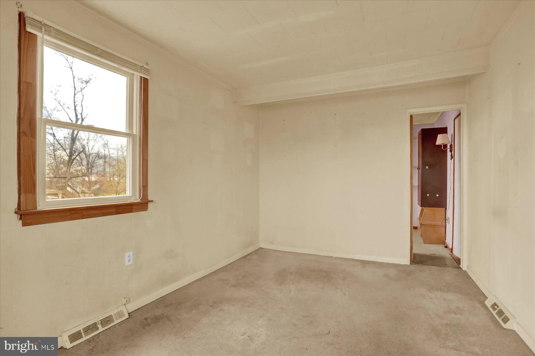 2115 White House Road Bel Air, MD 21015 - Photo 9 of 30 an empty room with windows