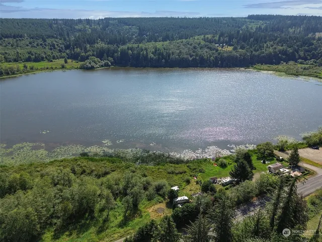 a view of a lake with a mountain in the background