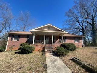475 South Broad Street Toccoa, GA 30577 - Photo 1 of 1 a front view of a house with a yard