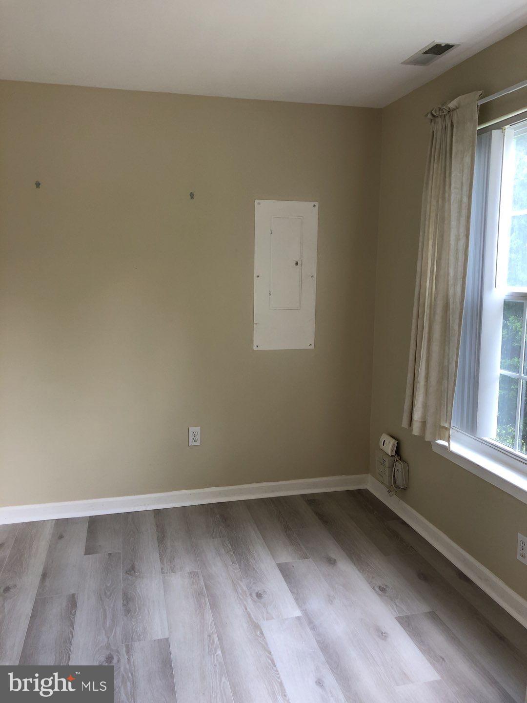 6134 Quiet Times Columbia, MD 21045 - Photo 3 of 17 an empty room with a window