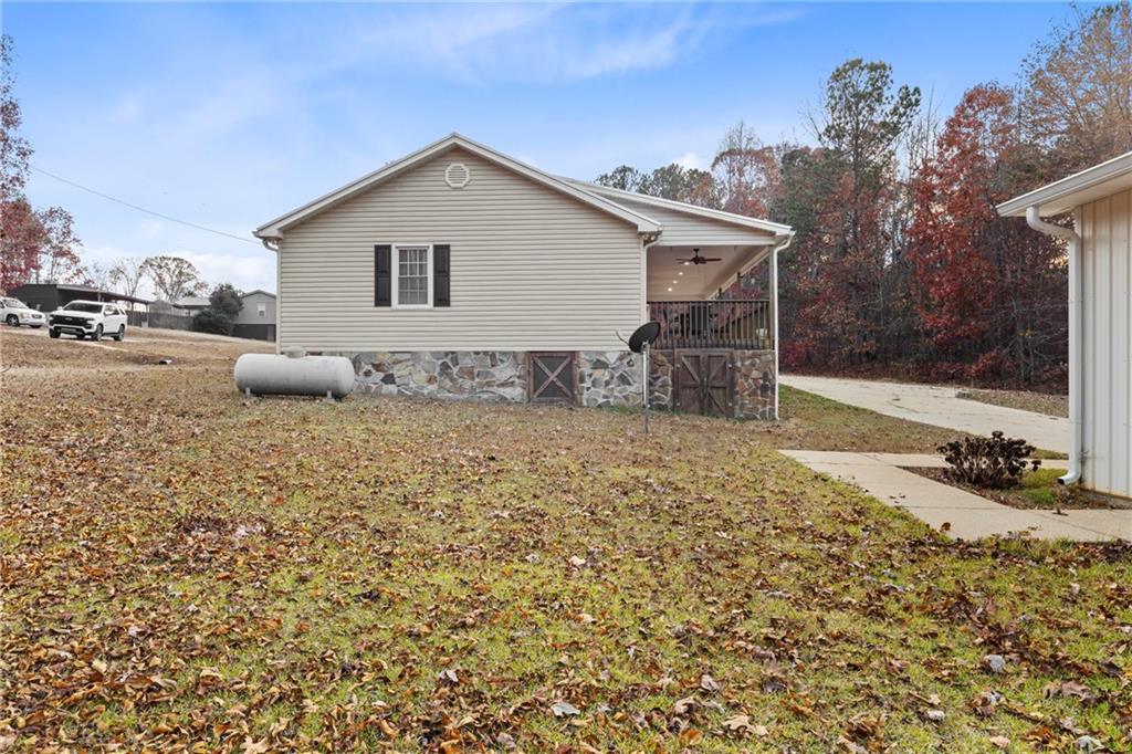 51 Perry Lane Buchanan, GA 30113 - Photo 27 of 33 a house view with a backyard space