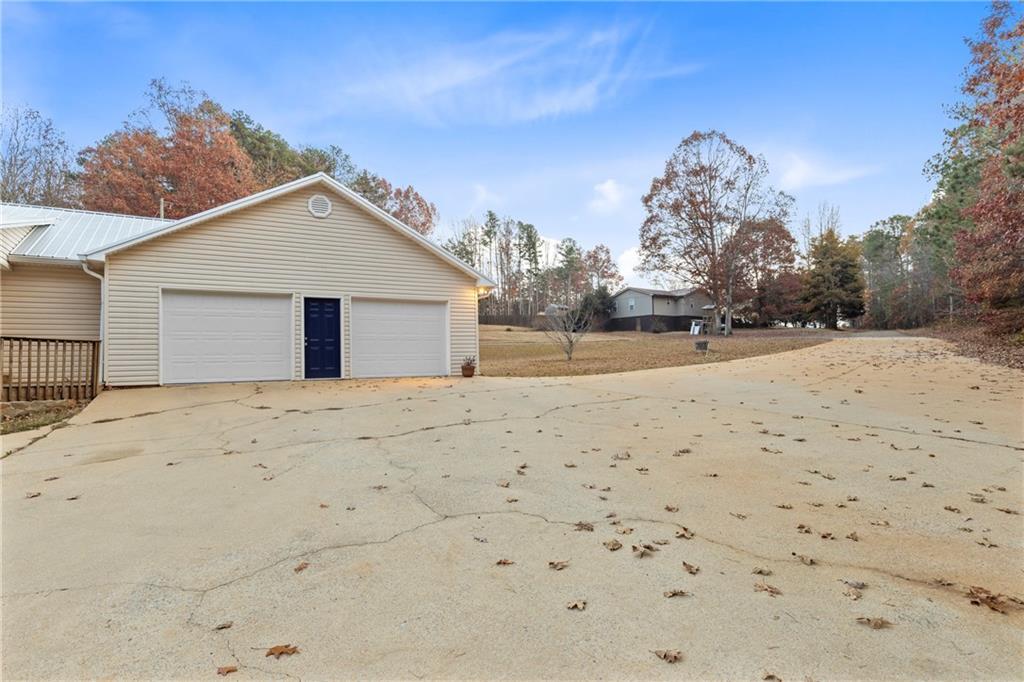 51 Perry Lane Buchanan, GA 30113 - Photo 29 of 33 a view of a dry yard with a house