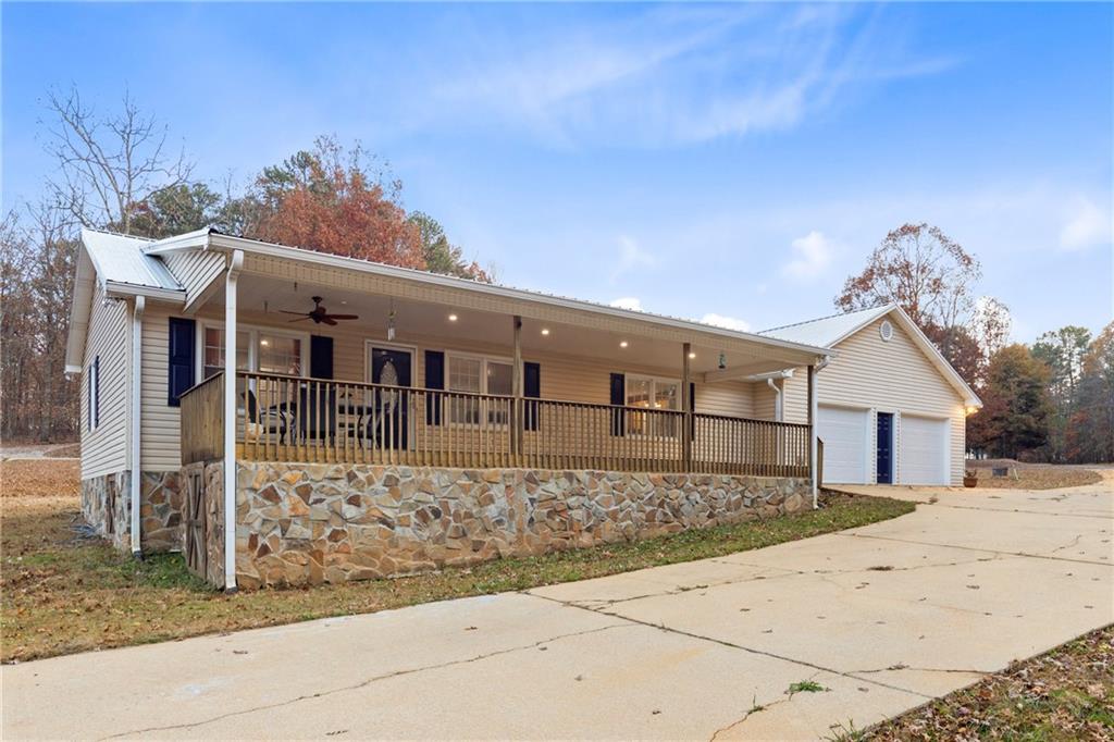 51 Perry Lane Buchanan, GA 30113 - Photo 3 of 33 front view of a house with a street