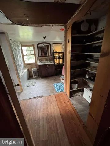 a view of staircase with wooden floor