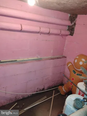 a living room with furniture and window