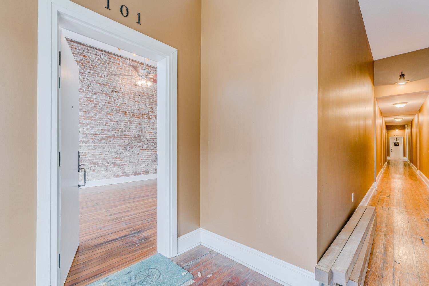 310 South Main Street, Unit 101 Memphis, TN 38103 - Photo 6 of 29 a bathroom with a glass shower door