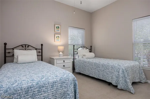 an aerial view of a house with a lake view