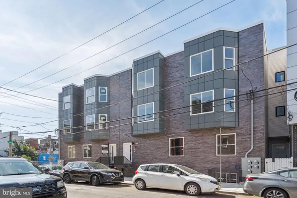 a car parked in front of a building