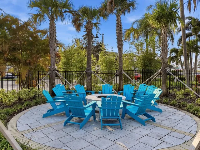 a view of a lounge chairs in a patio