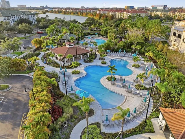 an aerial view of a house with outdoor space