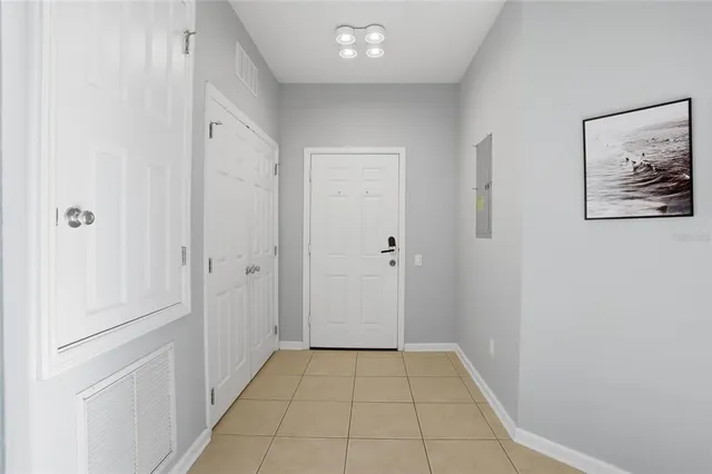 a view of room with window and hallway