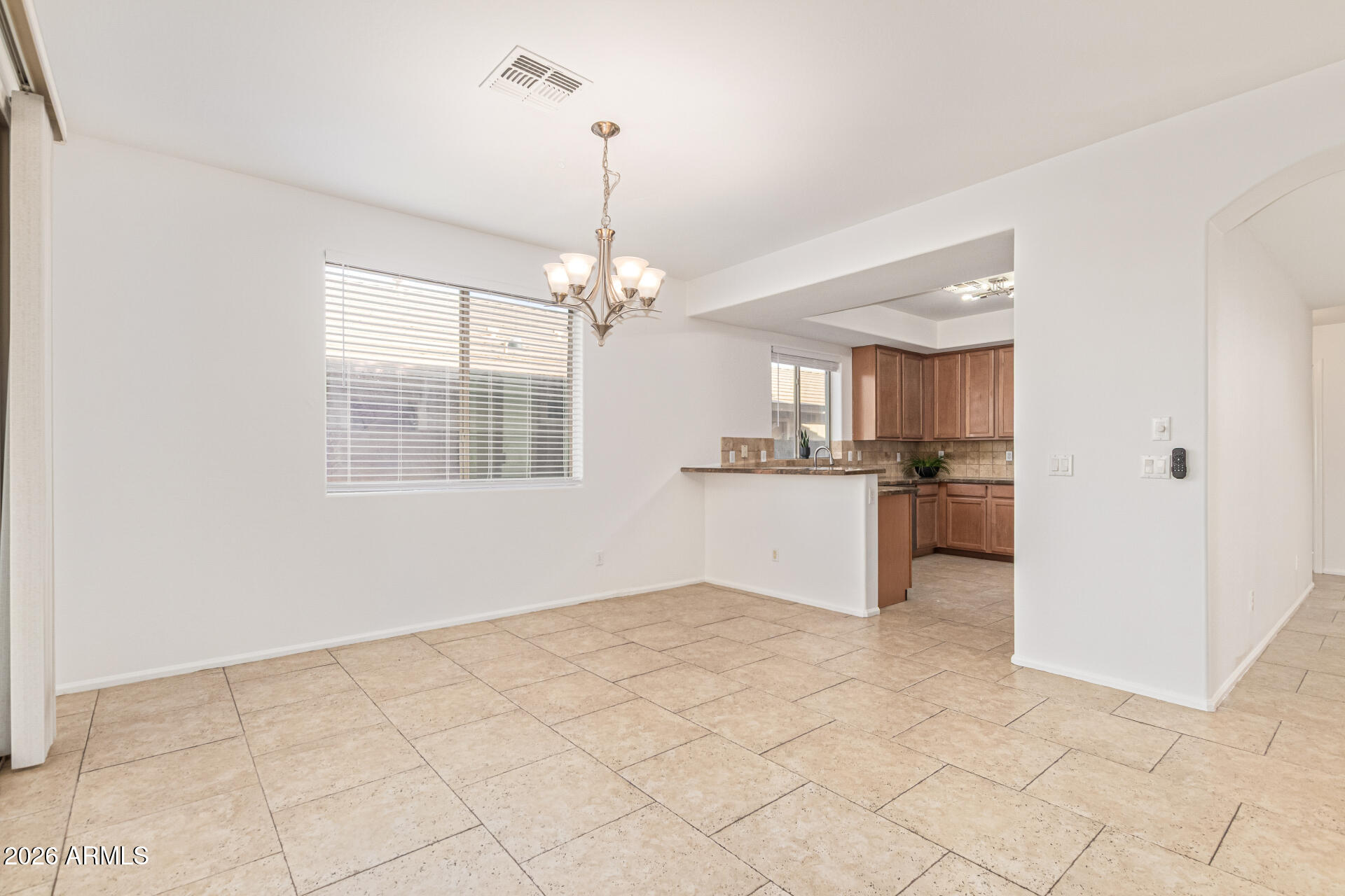 21324 Karsten Drive Maricopa, AZ 85138 - Photo 12 of 49 a view of a kitchen with marble kitchen and cabinets