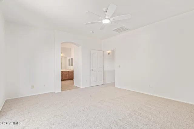 a bathroom with a bathtub shower and a sink