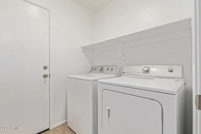 a view of yard with patio