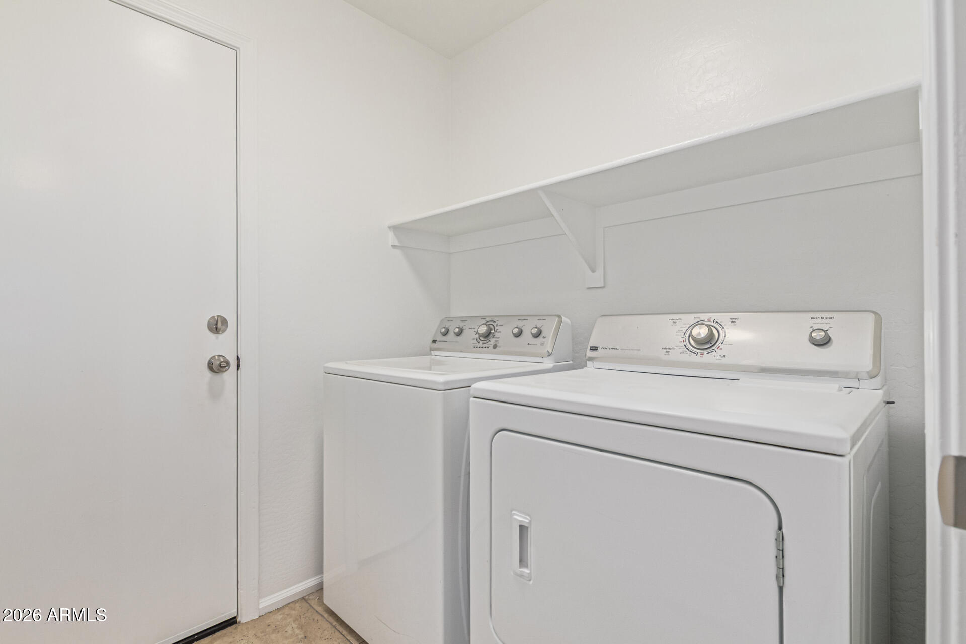 21324 Karsten Drive Maricopa, AZ 85138 - Photo 34 of 49 a utility room with dryer and washer