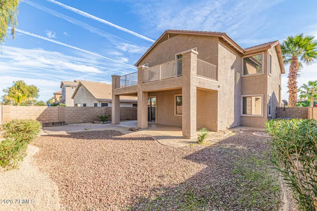 a view of a ocean with a building in the background