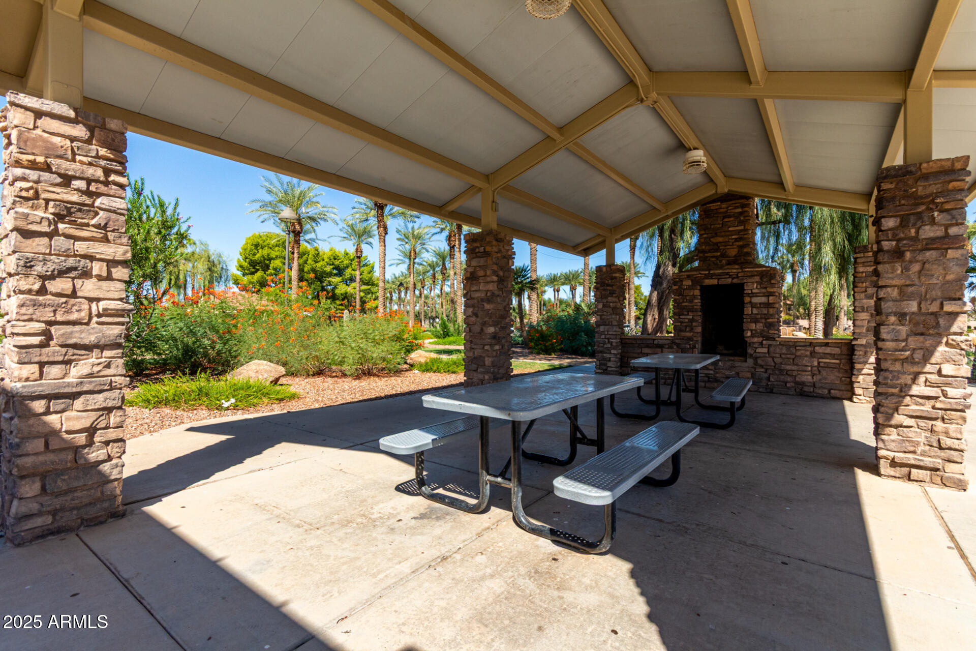 21324 Karsten Drive Maricopa, AZ 85138 - Photo 46 of 49 a building outdoor space with patio furniture and potted plants