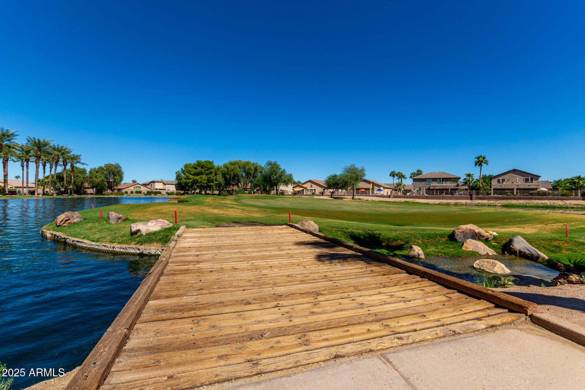 21324 Karsten Drive Maricopa, AZ 85138 - Photo 47 of 49 a view of a swimming pool with a yard and outdoor seating