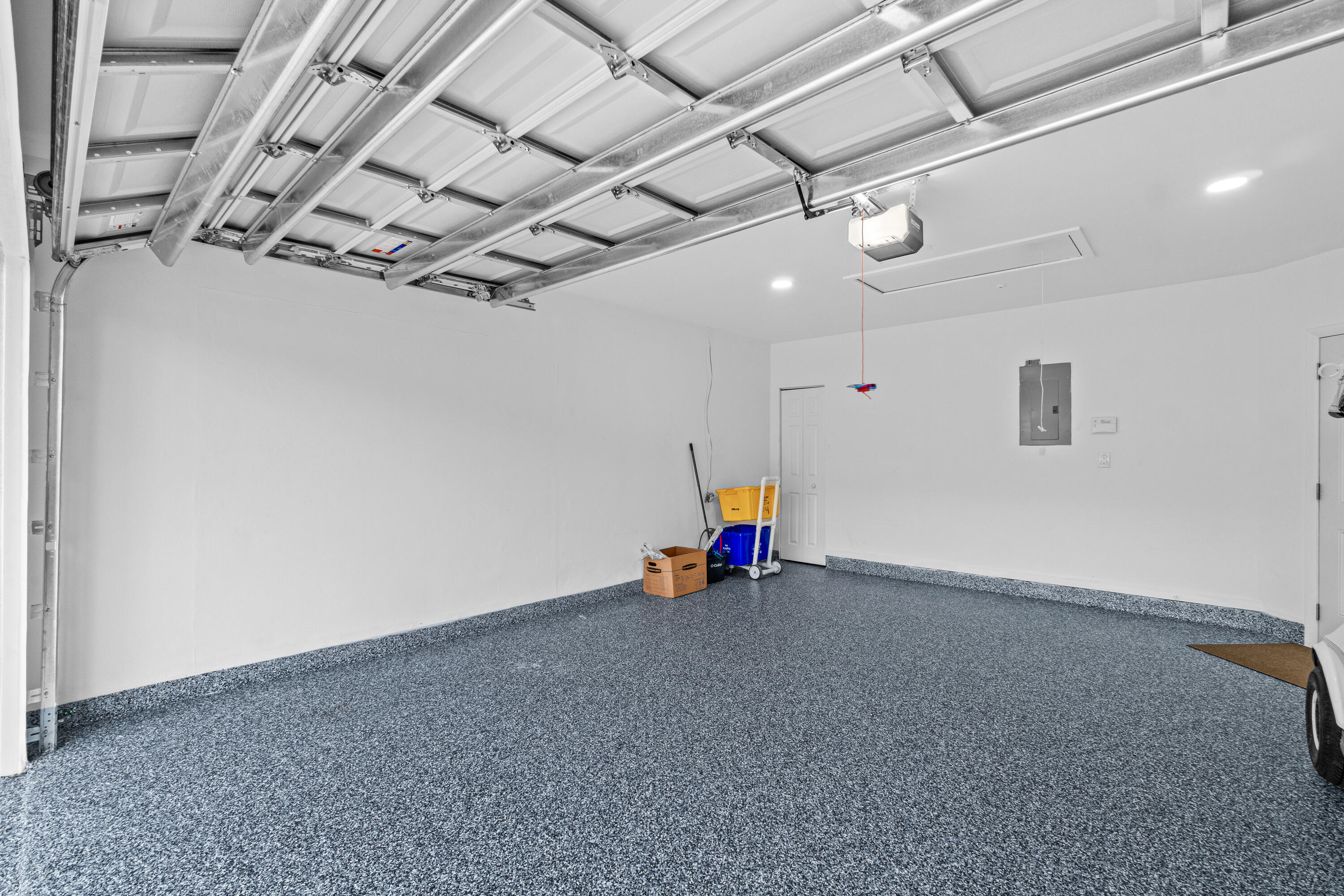 5097 Windsor Parke Drive Boca Raton, FL 33496 - Photo 30 of 30 a view of a empty room with a ceiling fan